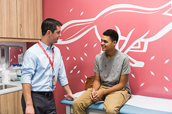 Doctor check up with teen